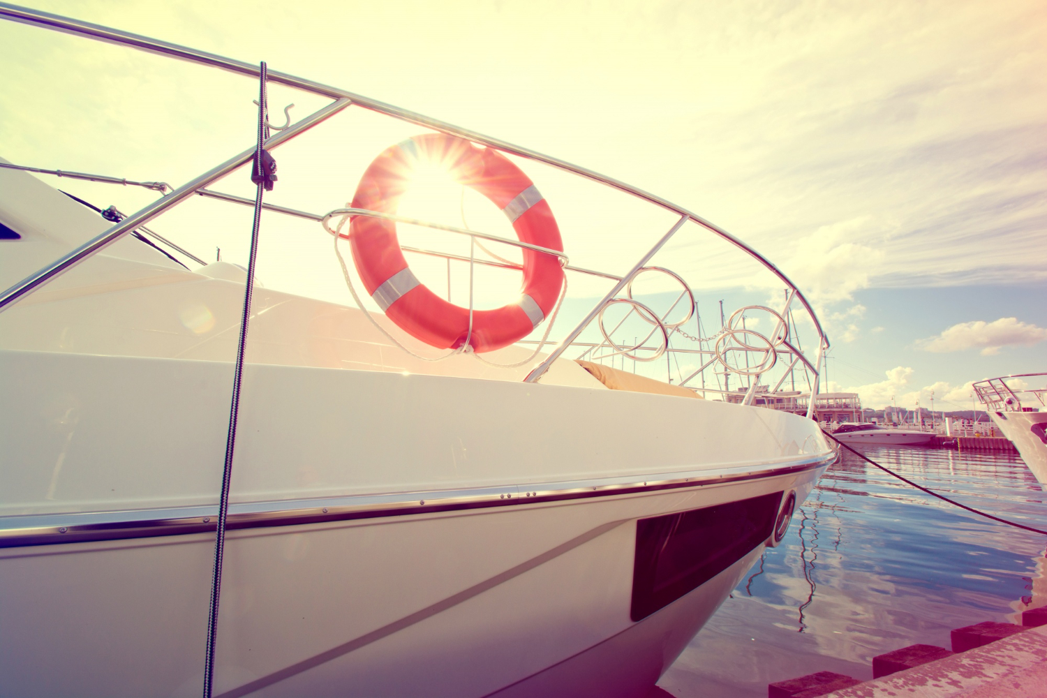Pristine boat hull and deck after professional waxing and polishing